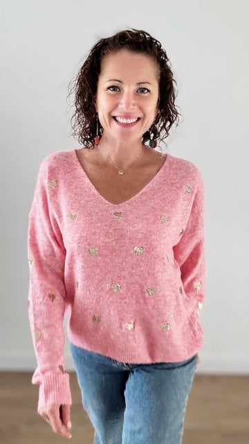 Le pull court rose coeurs