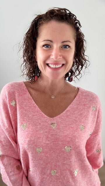 Le pull court rose coeurs