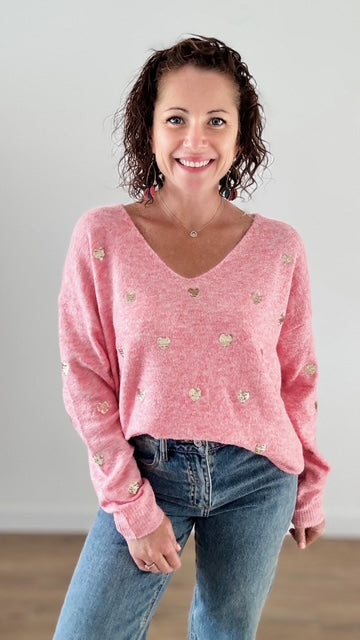 Le pull court rose coeurs