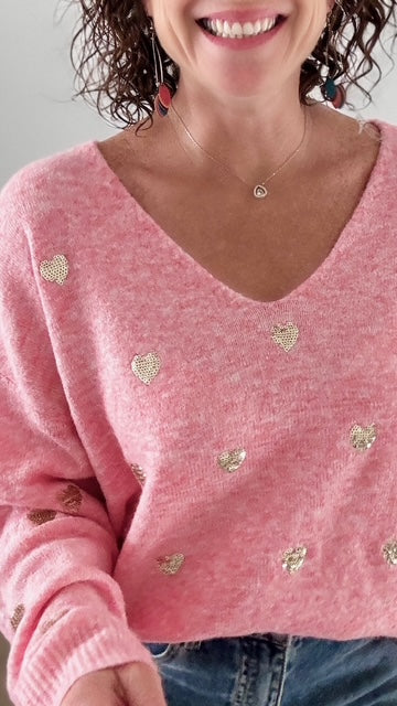 Le pull court rose coeurs