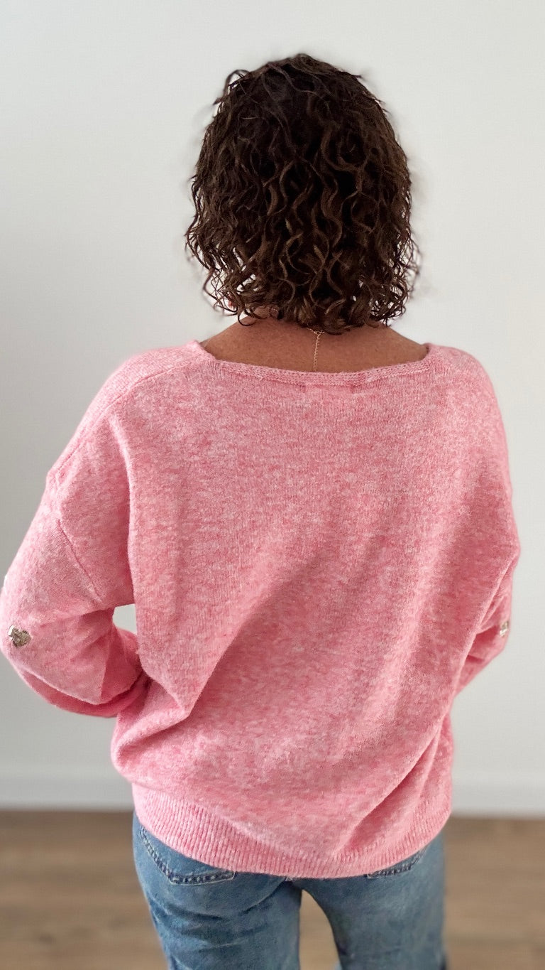 Le pull court rose coeurs